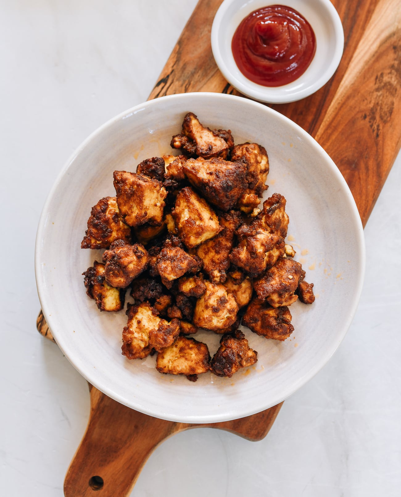 Air Fryer Tofu on plate with ketchup