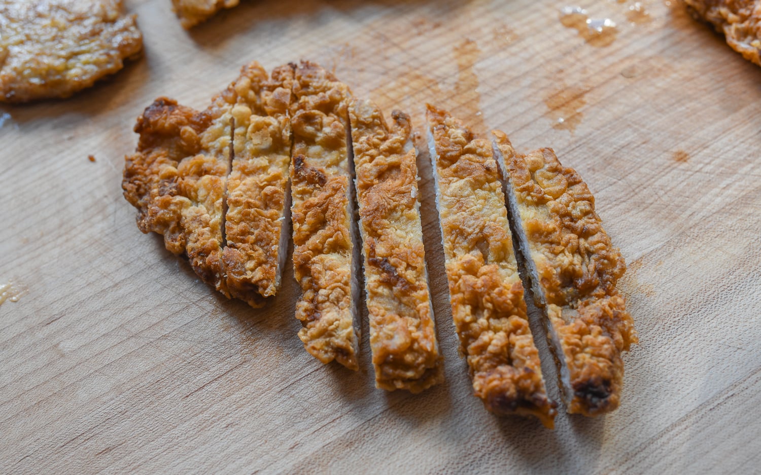 breaded and fried pork chop cut into slices