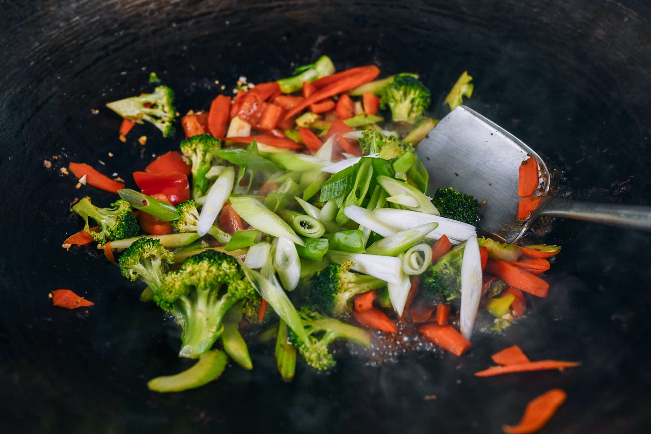 scallions added to stir-fried vegetables