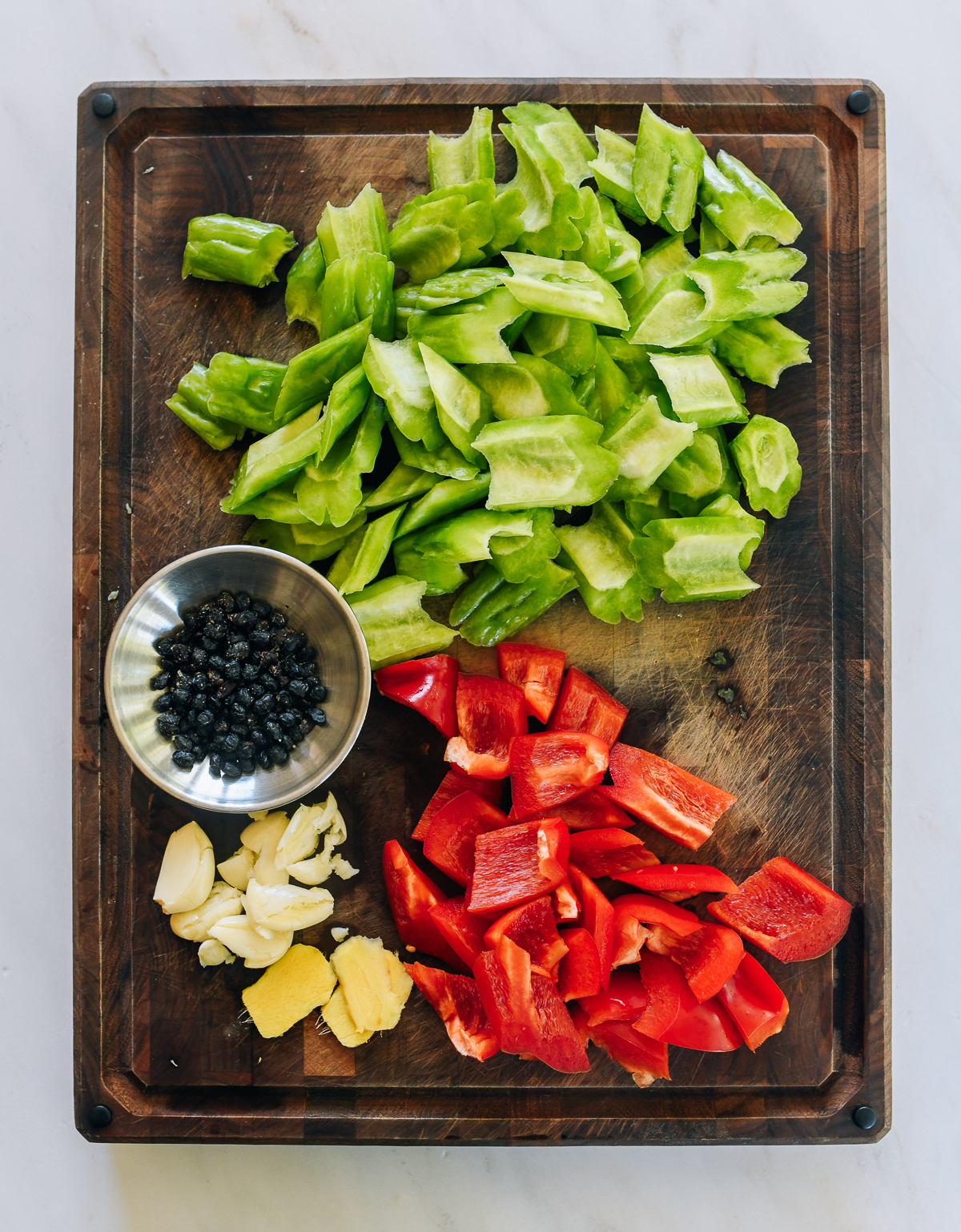 ingredients for braised ribs and bitter melon on cutting board