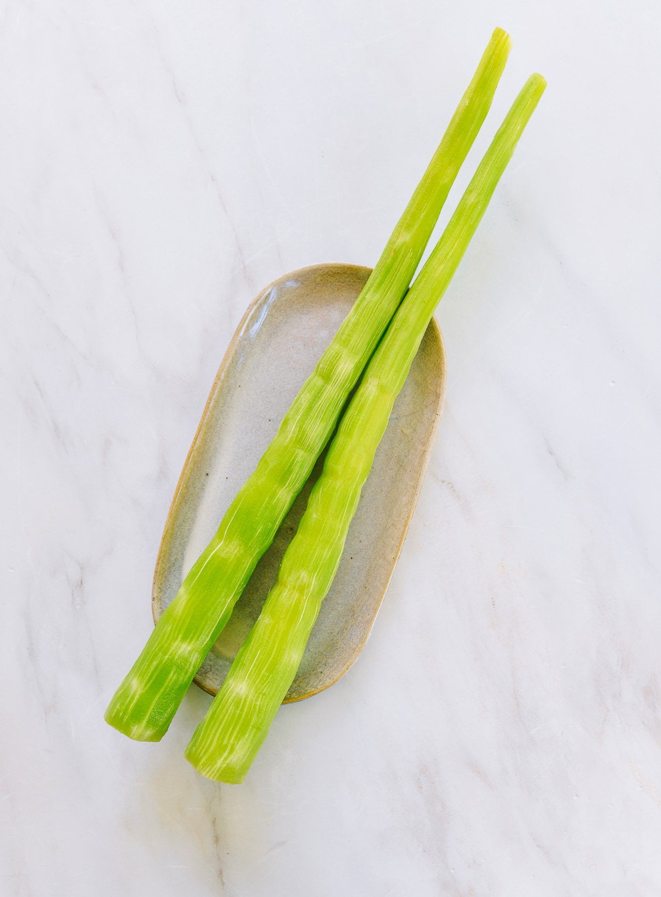 two peeled celtuce