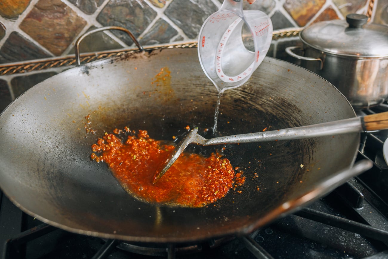 Adding water to sauce