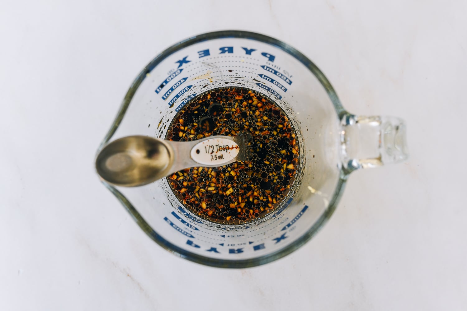 ginger beef sauce mixture in measuring cup