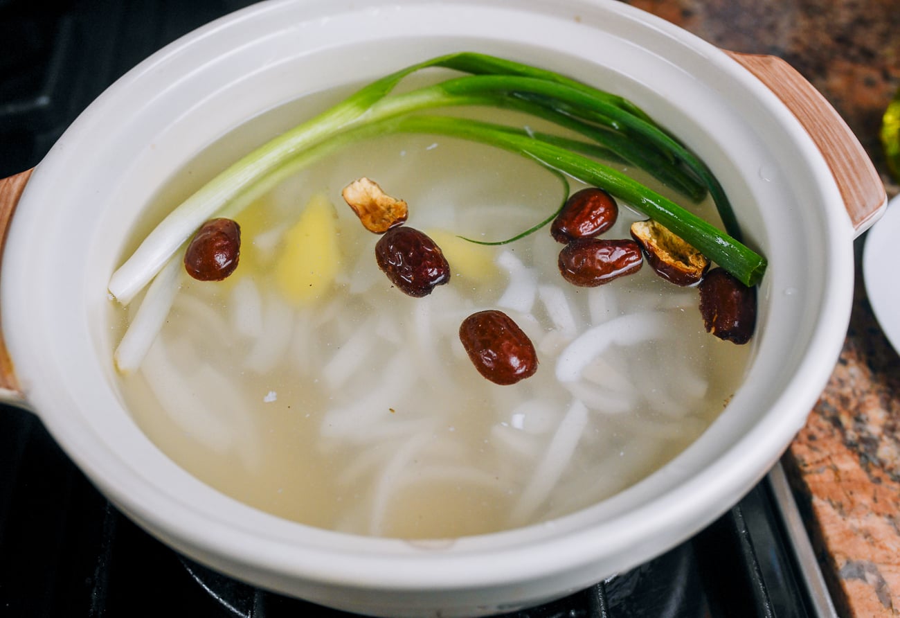 scallions, ginger, dried dates, coconut, water in soup pot