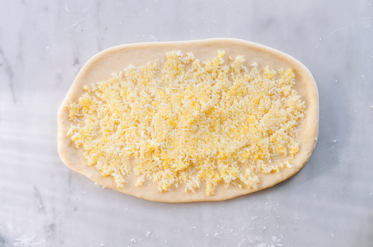 Filling evenly spread on dough