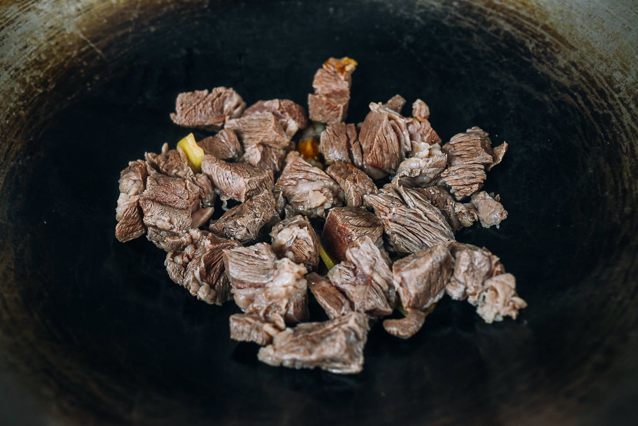 beef chunks in wok