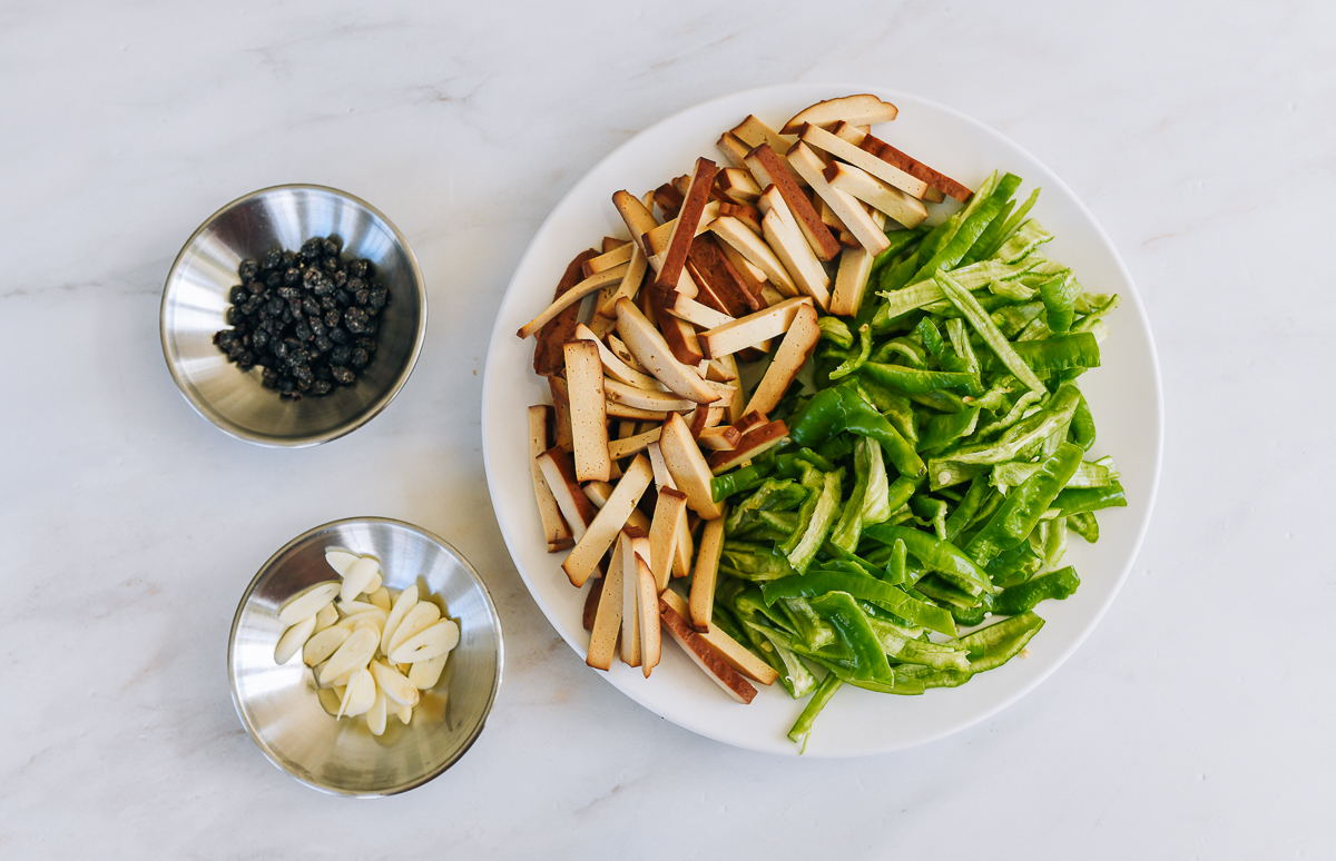 black beans, garlic, and pressed tofu strips, and green peppers