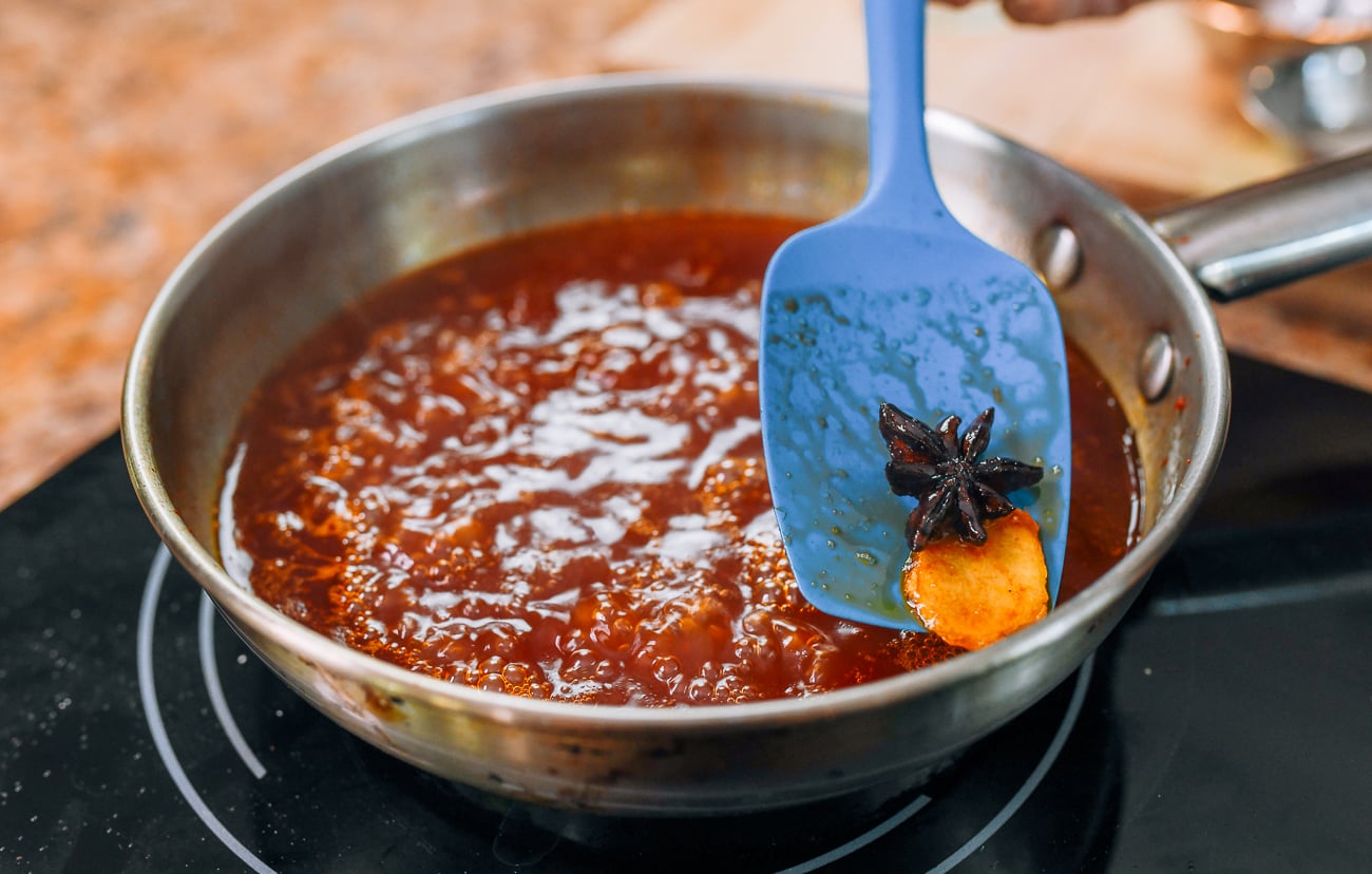 removing star anise and ginger slice from sweet and sour sauce