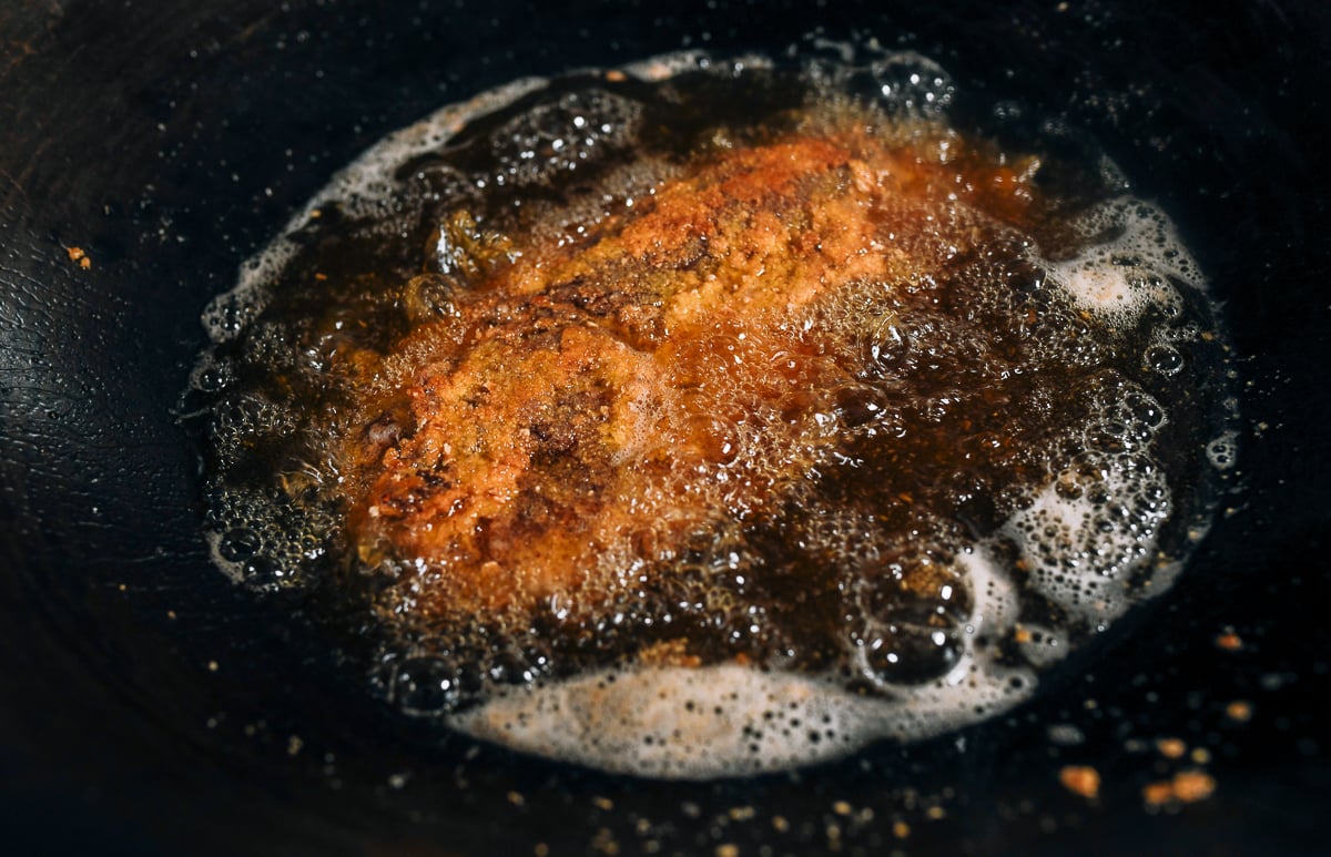 frying mandarin pressed duck